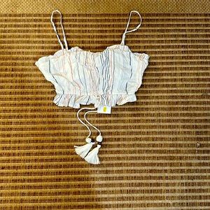 I am selling a women’s crop top, beach vibes